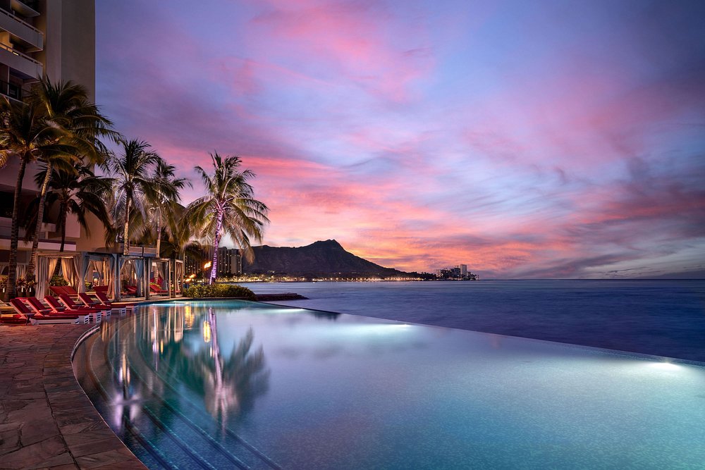 View of edgeless pool in Sheraton Waikiki along the coastline.